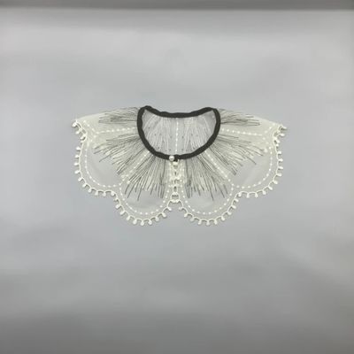 Intricately Embroidered Lace Fabric Embellished With Exquisite Patterns And Detailed Stitching