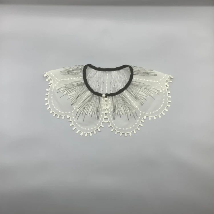 Intricately Embroidered Lace Fabric Embellished With Exquisite Patterns And Detailed Stitching