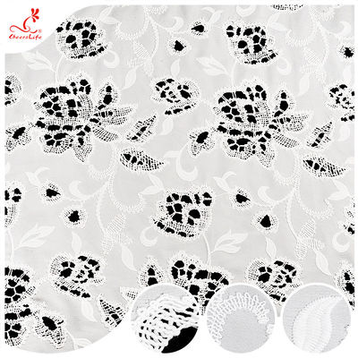 مبيعات ساخنة النسخ الأبيض النسيج الزهري النسيج الناعم المجوف للعين البوليستر النسيج المطرز